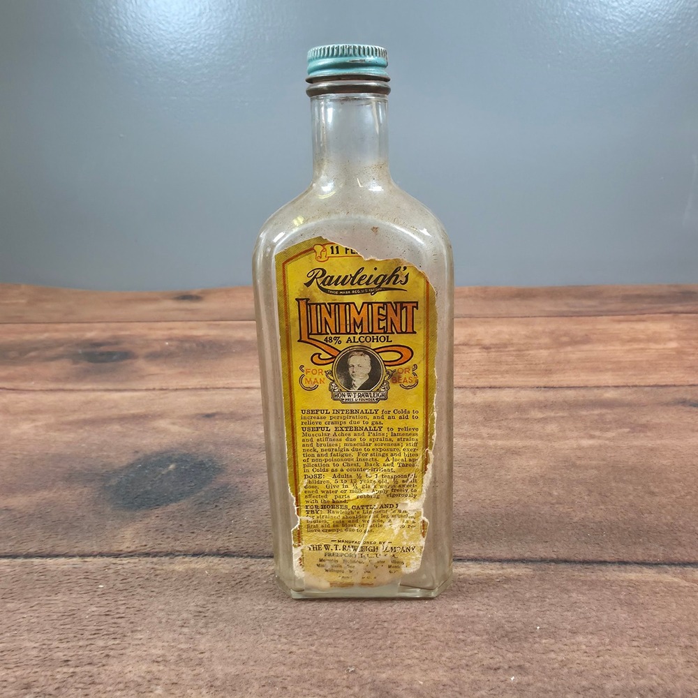 Rawleigh's Liniment Bottle 11oz Clear Good Vintage Embossed Paper Label Cap